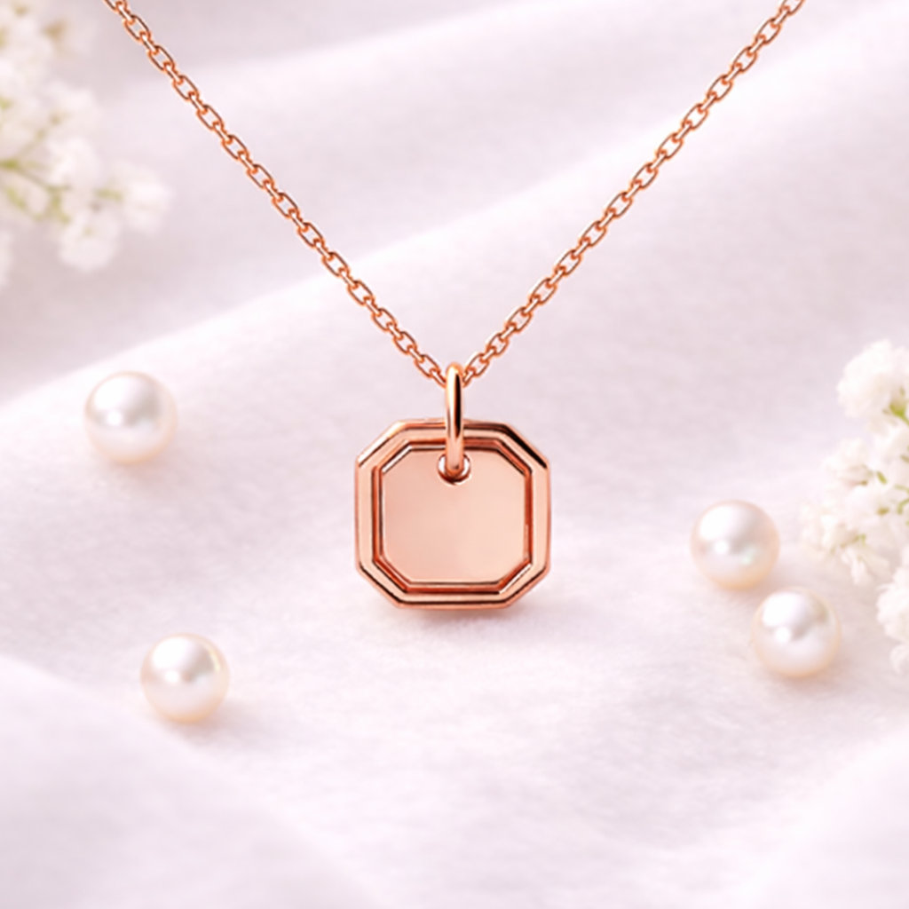 Rose gold necklace with a hexagonal pendant on a light background with pearls.